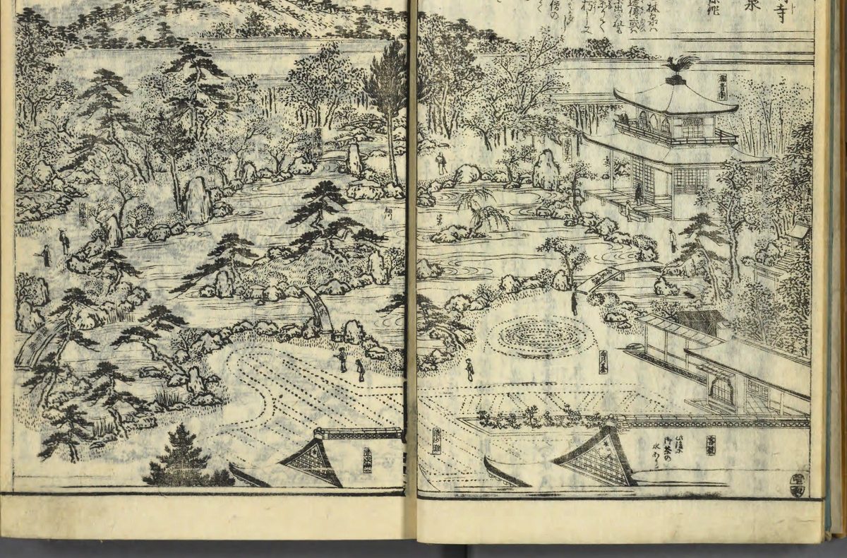 白い砂の庭と池のそばにたつ建物を、墨一色でえがいた木版の絵