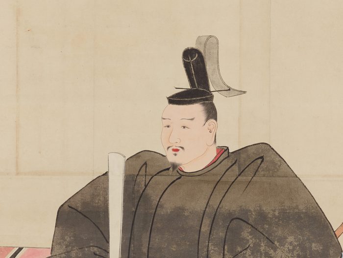 黒いぼうしをかぶり、黒い着物を着て、あごひげのある男性の肖像画